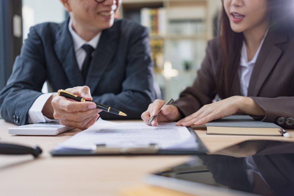 Lawyer or judge consult, Businessman and woman lawyers discussing about contract and agreement concept.